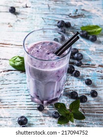 Fresh Milk, Blueberry Drink On Wodeen Table, Assorted Protein Cocktail With Fruits.