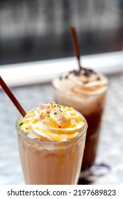 Fresh Milk Caramel Shake, Soft Yellow Color, Smooth Texture, Sweet Taste. In A Retro Tall Glass With Chocolate Milk Shake Delicious Brown. Sprinkle Small Pieces Of Chocolate