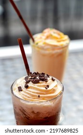 Fresh Milk Caramel Shake, Soft Yellow Color, Smooth Texture, Sweet Taste. In A Retro Tall Glass With Chocolate Milk Shake Delicious Brown. Sprinkle Small Pieces Of Chocolate