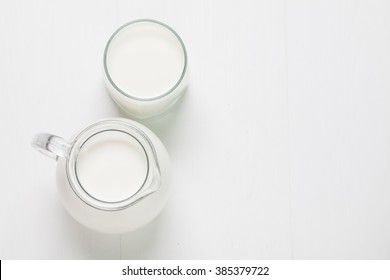 Fresh Milk In Glasses Bottle, Dairy Produce Concept Of Breakfast On Wood Table Background, Country Rustic Still Life Style, Vintage Tone, Top View. Space For Text.