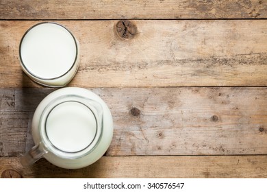 Fresh Milk On Glasses Bottle, Dairy Produce Concept Of Breakfast On Wood Table Background, Country Rustic Still Life Style, Vintage Tone, Top View. Space For Text.