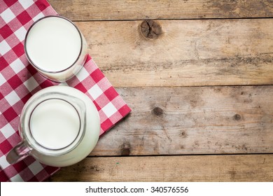 Fresh Milk On Glasses Bottle, Dairy Produce Concept Of Breakfast On Wood Table Background, Country Rustic Still Life Style, Vintage Tone, Top View. Space For Text.