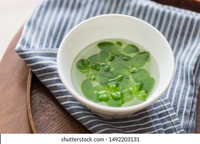 Fresh Mint Leaves Soaked In White Bone China Bowl