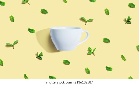 Fresh Mints With Tea Cup Overhead View - Flat Lay