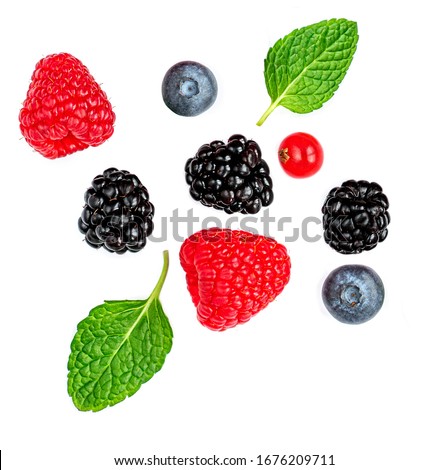 Fresh mix  berries isolated on white background. Strawberry, Raspberry, cranberry, Blueberry and Mint leaf, flat lay. Top view