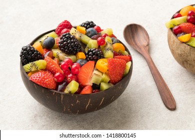 Fresh Mix Of Fruits In A Coconut Bowl