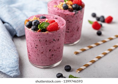 Fresh Mixed Berry Smoothie Topped With Granola