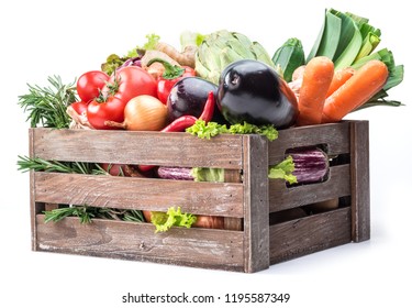 Fresh multi-colored vegetables in wooden crate. - Shutterstock ID 1195587349