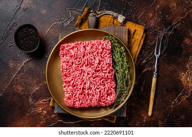 Fresh Mutton Lamb Mince Meat, Raw Ground Meat. Dark Background. Top View