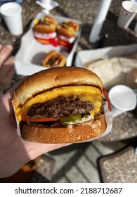 Fresh In N Out Burger With Cheese Oozing