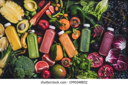 Fresh natural colorful organic juices over fruits vegetables berries background - Powered by Shutterstock