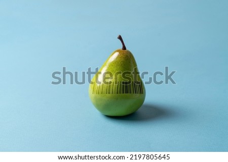 fresh new ripe fruit with a barcode on pastel background 