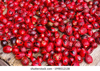 Fresh nutmegs in red mace on sale at a spice market stall at St George's on the caribbean island of Grenada
