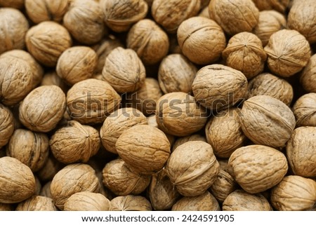 fresh nuts lie in boxes in the store, Walnut