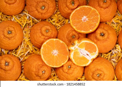 Fresh Orange Fruit In Wooden Box, Top View Dekopon Orange Or Sumo Mandarin Tangerine.