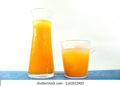 Fresh Orange Juice In A Carafe And A Glass