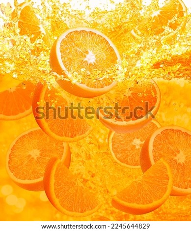 fresh orange slice drop on water splashing