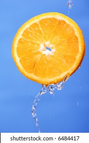 Fresh orange unter water. Fresh taste