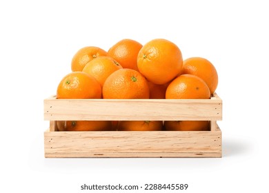 Fresh orange in wooden crate isolated on white background. Clipping path.