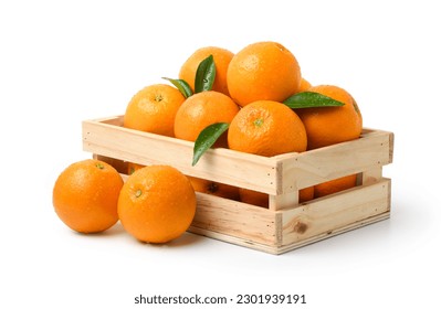 Fresh oranges with water droplets in wooden crate isolated on white background. Clipping path.
