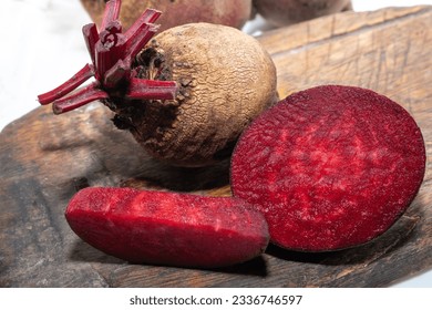 Fresh organic beet, beetroot. Red beets or beetroots on wooden background - Powered by Shutterstock