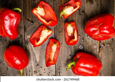Fresh organic bell pepper,sweet pepper or capsicum on black wooden background