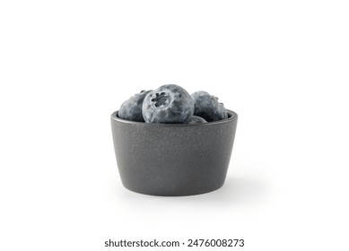 Fresh organic blueberries in small ceramic bowl isolated on white - Powered by Shutterstock