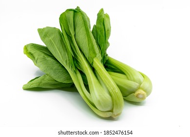 Fresh Organic Bok Choy Vegetable Or Chinese Cabbage Or Taiwanese Kale, Isolated Small Pile Of Bok Choy On The White Background.

