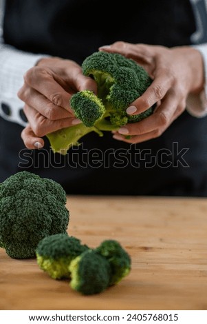 Fresh organic broccoli, a superfood rich in vitamin K, vitamin C, folic acid, potassium, phytonutrients, and fibers.