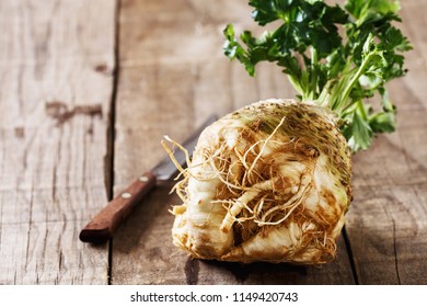 Fresh Organic Celeriac Root On Rustic Wooden Background Close Up