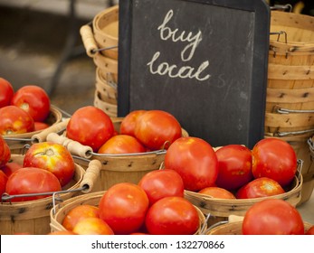 Fresh organic food at the local farmers market. Farmers markets are a traditional way of selling agricultural products.
