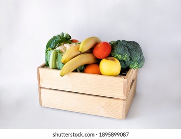 Fresh Organic Fruit And Vegetables In Wooden Crate. Food Delivery Concept.