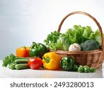 Fresh organic fruits and vegetables in wicker basket. Assorted fresh vegetables.