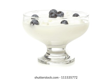 Fresh Organic Greek Yogurt With Blueberries On A Background