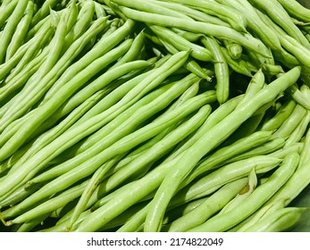 Fresh organic green beans(Bush bean,Snab bean,Green bean,Common bean)group in the container for sell in the supermarket. Ingredient for cooking food,delicious with very good benefits and high vitamins