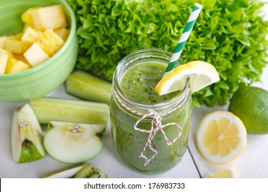 Fresh Organic Green Smoothie With Salad, Apple, Cucumber, Pineapple And Lemon As Healthy Drink