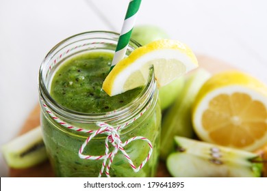 Fresh Organic Green Smoothie With Salad, Apple, Cucumber, Pineapple And Lemon As Healthy Drink