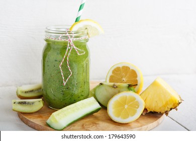 Fresh Organic Green Smoothie With Salad, Apple, Cucumber, Pineapple And Lemon As Healthy Drink