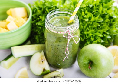 Fresh Organic Green Smoothie With Salad, Apple, Cucumber, Pineapple And Lemon As Healthy Drink