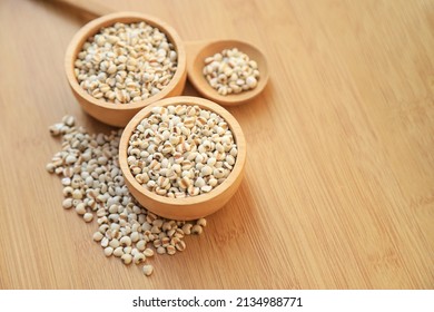 Fresh organic millet or job's tear seed on sack in bowl  in kitchen for cooking in daily life meal. selective focus. top view. - Shutterstock ID 2134988771