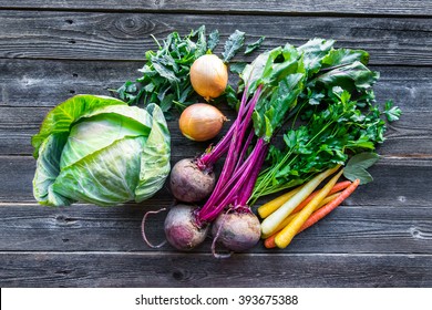 Fresh organic produce. Cabbage, Beets, Carrots, Onions, Kale and Parsley - Powered by Shutterstock