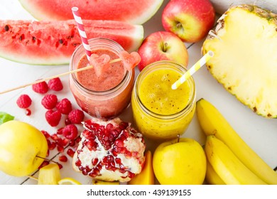 Fresh Organic Red And Yellow Smoothie With Apple, Watermelon, Pomegranate, Raspberry, Pineapple, Banana And Mango. Healthy, Vegan Drinks.