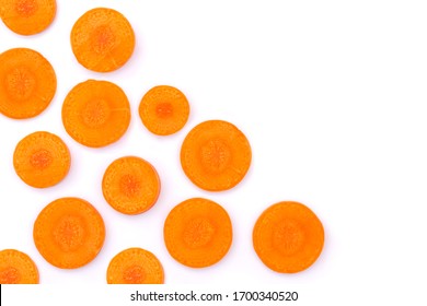 Fresh organic slice of orange carrot isolated on white background. Top view. Flat lay. Copyspace for text.