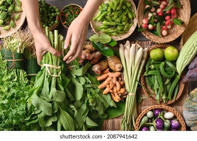 Fresh organic Southeast Asian vegetables and spices from local farmer market, Northern of Thailand, Sustainability concept, Table top view