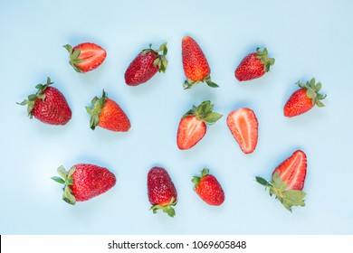 Fresh organic strawberry on blue background. Flat lay. Pattern. - Shutterstock ID 1069605848