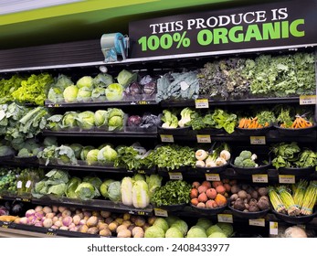 Fresh organic vegetable selection in produce aisle at grocery store supermarket. - Powered by Shutterstock