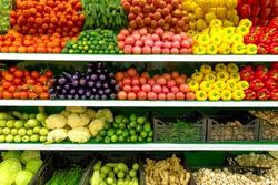 Fresh Organic Vegetables And Fruits On Shelf In Supermarket, Farmers Market. Healthy Food Market Concept. Vitamins And Minerals In Vegetables And Fruits. Fresh Vegetables Tomatoes, Capsicum, Cucumbers