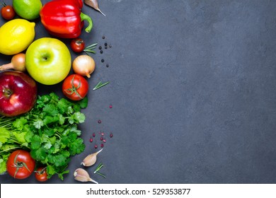Fresh organic vegetables, fruits and spices on stone background with copy space for text. Top view, horizontal composition. Healthy food, fresh food, healthy eating and vegan concept - Powered by Shutterstock