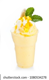 Fresh organic yellow smoothie with banana and mango, detox and healthy food.