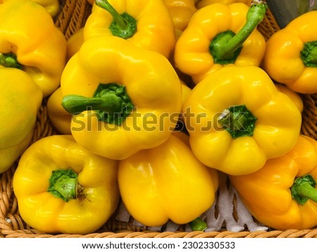 Fresh organic yellow sweet pepper (bell pepper,capcicum) group for sell in the supermarket. Ingredient for cooking food. Delicious with very good benefits and high vitamins for healthy eating.
